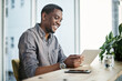 © peopleimages.com - Black man, tablet and smile in office for professional career, good news and business opportunity. Graphic designer, happy and tech with wireframe for ux design, social media and infographic on web