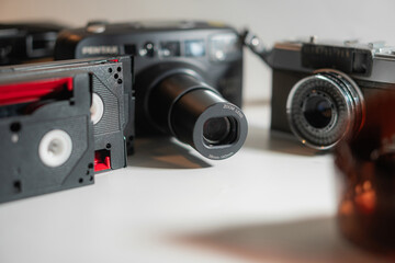 Vintage Cameras and VHS Tape Close-Up