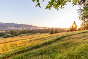 Sunrise over the meadows. Summer morning in the Zakopane valley with a view of Gubalowka