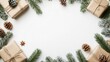 © Maria Mikhaylichenko - Festive holiday frame with rustic wrapped gifts, pine branches, and pinecones on white background, creating a cozy Christmas atmosphere.