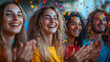 © Warakorn - Group of happy individuals standing in a circle, clapping and smiling at each other, their celebration of victory highlighted by colorful confetti.