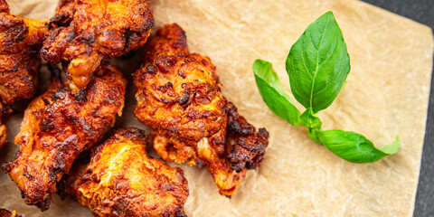 Wall Mural - chicken wings barbecue fried bbqpoultry fresh meal food snack on the table copy space food background rustic top view