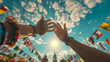 © Galina Perevozova - International Friendship Day, human hands up on background of flags of various countries and sky