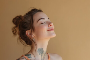 Wall Mural - A close up of a woman's face with tattoos and her eyes closed