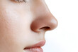 © Oksana - Woman's nose close up side view isolated on white background