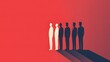 © khunnapat - A group of people stand in a line, with one person standing out from the rest, representing individuality.
