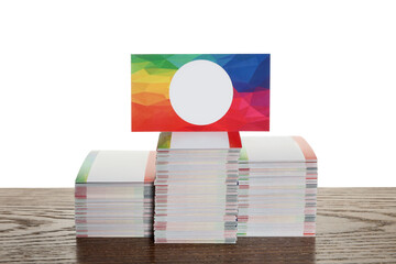 Sticker - Many business cards on wooden table against white background