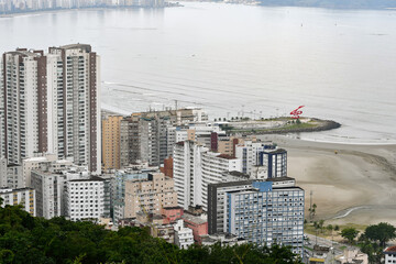 Wall Mural - Aerial view of Santos coast, some buildings, the beach and the view to the breakwater. Santos - SP, Brazil. 