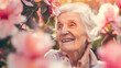 © vitor - Uma senhora idosa radiante está cercada por flores desabrochando, transmitindo tranquilidade e a alegria de estar na natureza.