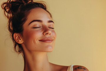 A close up of a woman's face with tattoos and her eyes closed