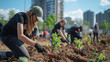 © filmanana - Urban community volunteers planting trees in city park