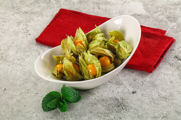 Wall Mural - Sweet ripe physalis in the bowl