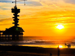 Wall Mural - sunset at the beach of scheveningen, netherlands 