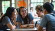 © boba - Students chat and laugh during break, sharing experiences from their summer vacations together