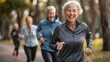 © BrightWhite - Four active senior women running together in park, smiling and enjoying exercise, promoting fitness and friendship in later life, healthy lifestyle for older adults.