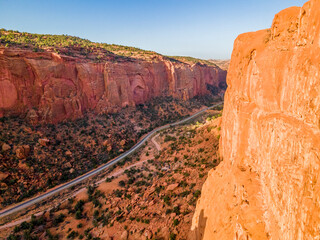 Desert road highway through red rock canyon Utah