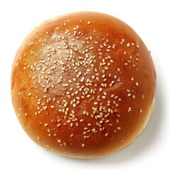 Top view shot of a hamburger bread bun, isolated on white background. The freshly baked, golden brown color and a sprinkling of sesame seeds on top.