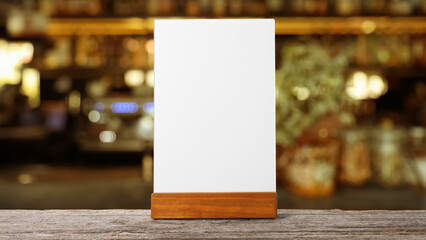 Sticker - Menu holder with blank card on wooden table in cafe. Mockup for design