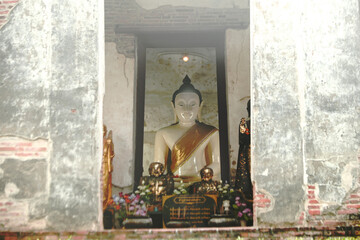 Luang Pho Khao” or Phra Phuttha Nimit Mongkol Sri Rattana Trai The pure white body is the art of the early Ayutthaya period. It is considered a sacred Buddha image that the villagers place their faith