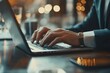© Visual Odyssey - Closeup of businessman typing on laptop computer at office. Business man working on computer device, searching the information, surfing the internet on table at, Generative AI