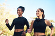 © peopleimages.com - Friends, women and exercise with running at forest in happiness for workout and jog in Atlanta. People, runner and smile or confident with fitness for health, wellness and self care on race at park