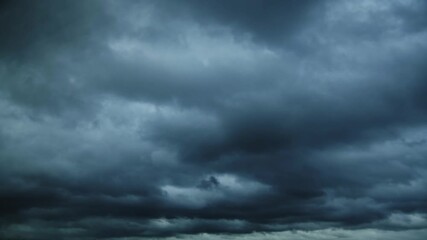 Wall Mural - time lapse of dark sky with storm clouds