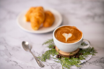 Wall Mural - coffee heart pattern with croissant