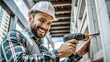© Dushan - smiley male builder wearing a hard hat and working.