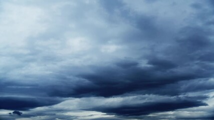 Wall Mural - Time lapse of sky with dark clouds, dramatic sky, storm clouds