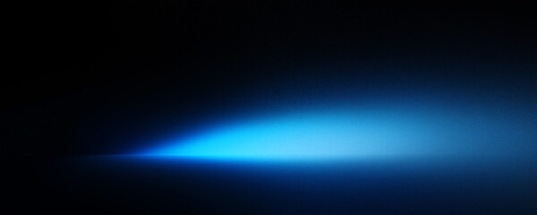 Wall Mural - Abstract blue spotlight on a black background banner with empty space for text.
