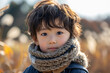 © Tetiana - Generative AI picture of a beautiful boy getting to know the world walking outdoors