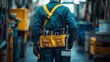 © Image Alchemy - The Mobile Repair Technician: A man in uniform carrying tools on-site, Generative AI