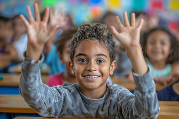 Wall Mural - Excited young boy with curly hair raising his hands in a lively classroom, surrounded by other children, engaged in an interactive learning environment.