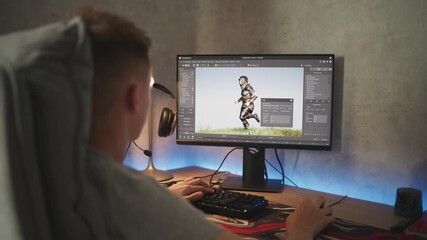 Young designer creates 3D model and animation of game character using computer. Interface of professional 3D modeling software. Teen boy working on freelance project on PC at home. Game development.