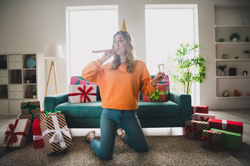 Poster - Full size photo of attractive young woman celebrate birthday have fun dressed orange outfit cozy day light home interior living room