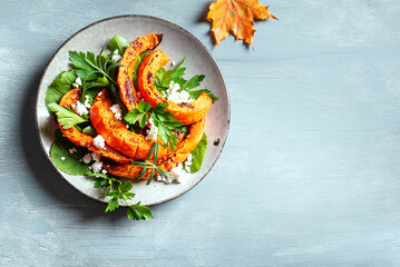 Wall Mural - Autumn salad with grilled pumpkin, feta cheese