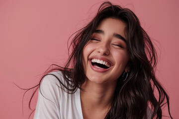 Wall Mural - A young Indian ethnic cute girl laughing out of joy	