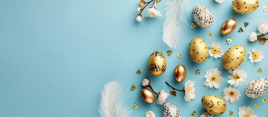 Canvas Print - Easter greeting card with golden eggs feathers flowers on blue Happy Easter card idea with copy space image top down view