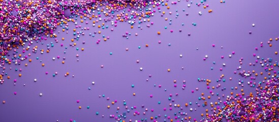 Aufkleber - Purple backdrop adorned with sugar sprinkle dots ideal for cakes and bakery displays with copy space image