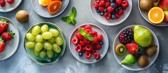 Aufkleber - A light table showcasing a variety of fresh fruits on plates ideal for a copy space image