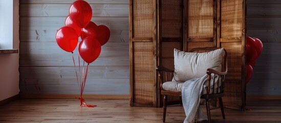 Poster - Valentine s Day decor in a living room featuring a chair folding screen and red balloons with a designated copy space image