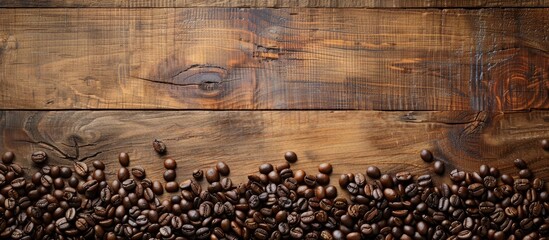 Aufkleber - A wooden background with coffee beans displayed and space for text or images. Creative banner. Copyspace image
