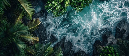 Poster - Vacation themed wallpaper depicting a serene seacoast with dark grey sea rocks adorned with lush greenery surrounded by waves with splashes of water including a copy space image