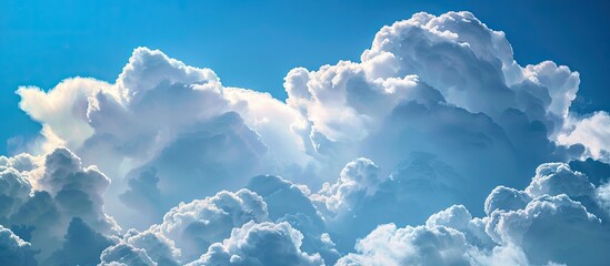 Aufkleber - Picture showing stunning fluffy cumulus clouds set against a vivid blue sky with ample space for additional elements Copy space image
