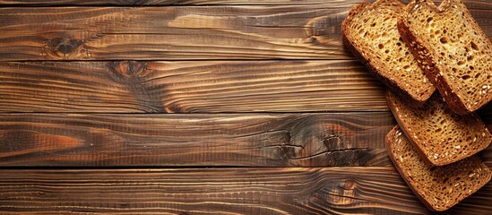 Poster - Wooden background holding sliced bread creating a copy space image
