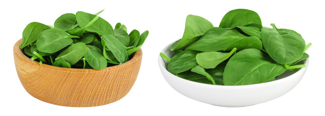 Wall Mural - Baby spinach leaves in wooden bowl isolated on white background