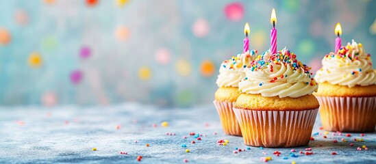 Wall Mural - creative happy birthday greeting featuring muffins and festive garlands fan greeting card copyspace 
