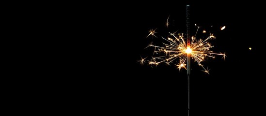 Aufkleber - Christmas sparkler against a black background. with copy space image. Place for adding text or design