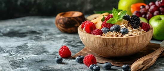 Leinwandbilder - Oatmeal in a wooden bowl is on the table accompanied by fruits This represents a choice for a healthy lifestyle Breakfast. with copy space image. Place for adding text or design