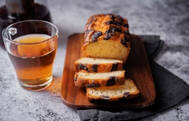 Wall Mural - Poppy seed cake with cup of tea